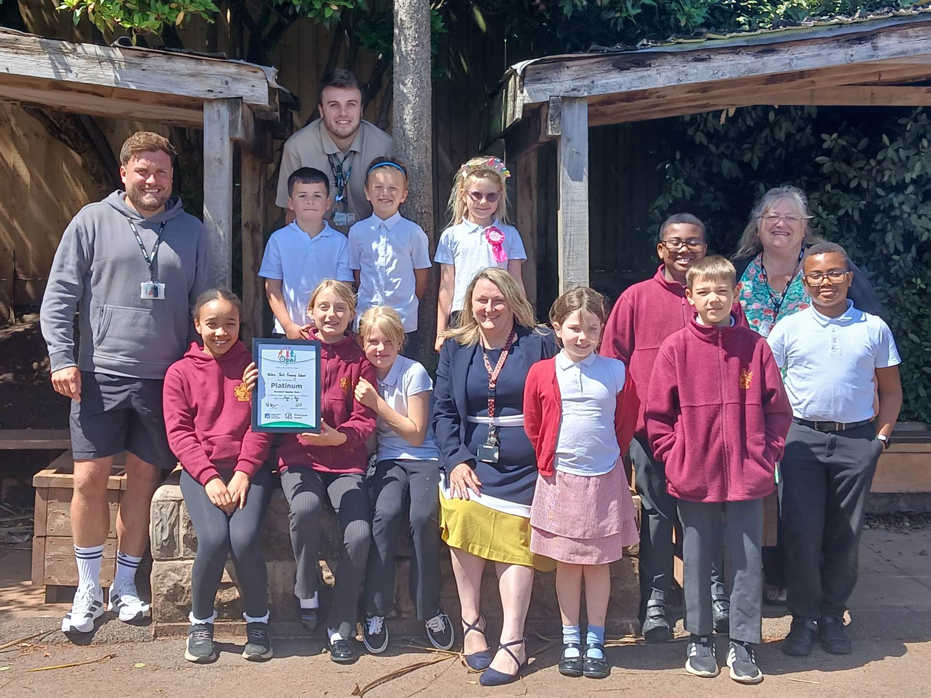 School children and staff receiving platinum OPAL award